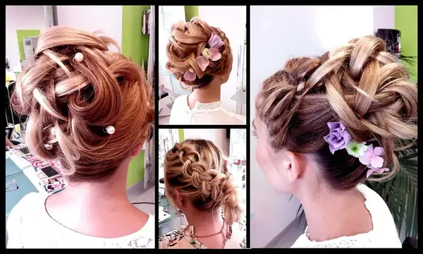 Elegante Hochsteckfrisur mit geflochtenen Elementen und Blumen, ideal für Hochzeit oder Abiball.
